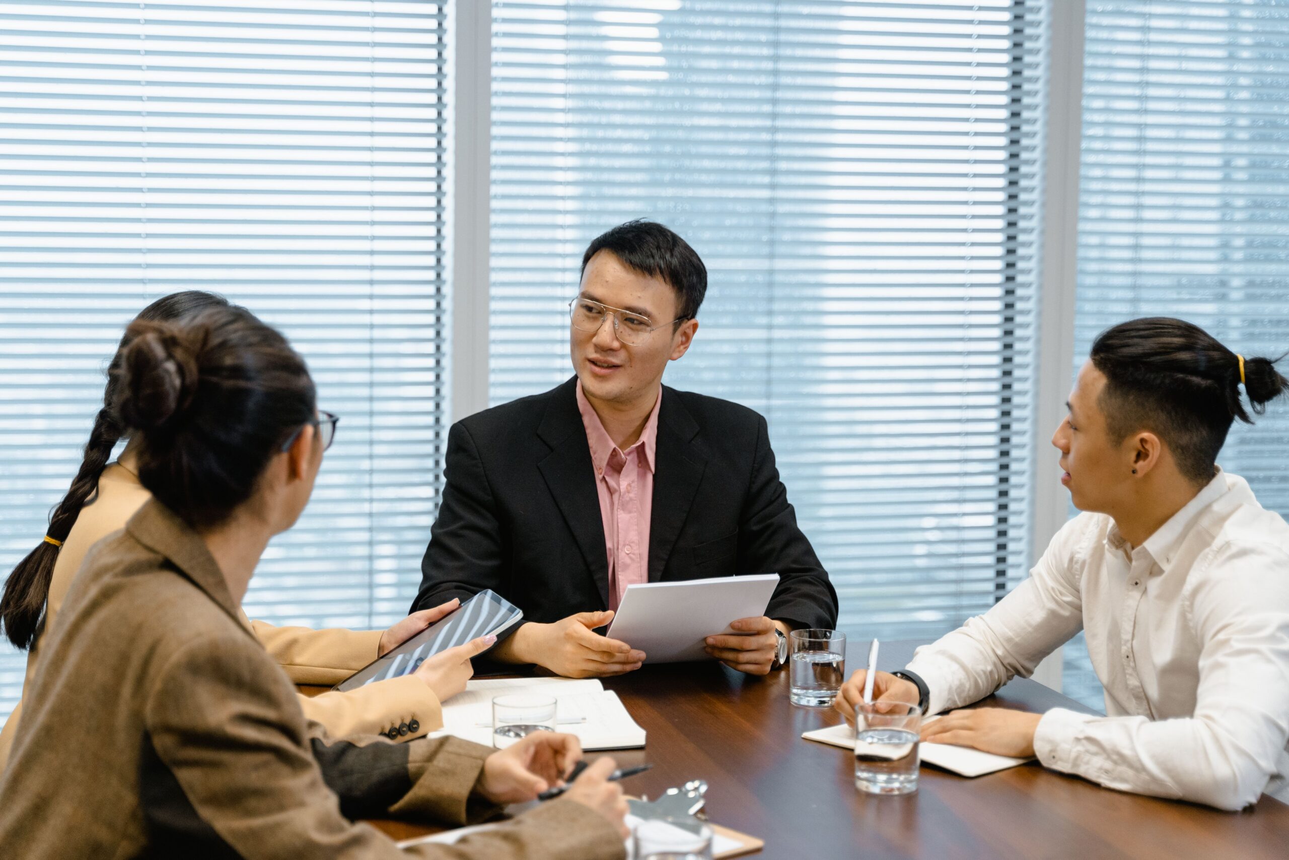 People in the middle of a meeting.